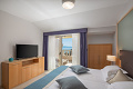 Aparthotel Flora, Tuepi