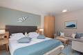 Aparthotel Flora, Tuepi