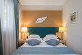 Aparthotel Flora, Tuepi